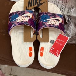NWT Women’s Nike Slides , Size 8