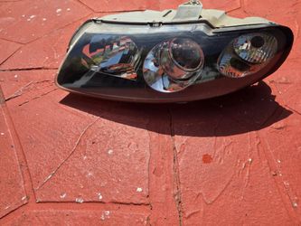 06 gto  headlight  driver side