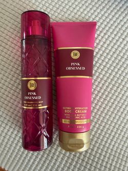 The Bath & Body Works Pink Obsessed Ultimate Hydration Body Cream features a vibrant pink tube with gold accents and a rich formula made with shea but