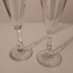 Champagne Glasses And Wedding Plates