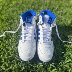 Brand New Adidas Forum Mid. Blue and White. Never used. Size 9.5