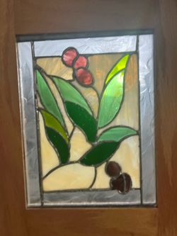 Handmade olive branch stained glass panel featuring textured green leaves and dark berries