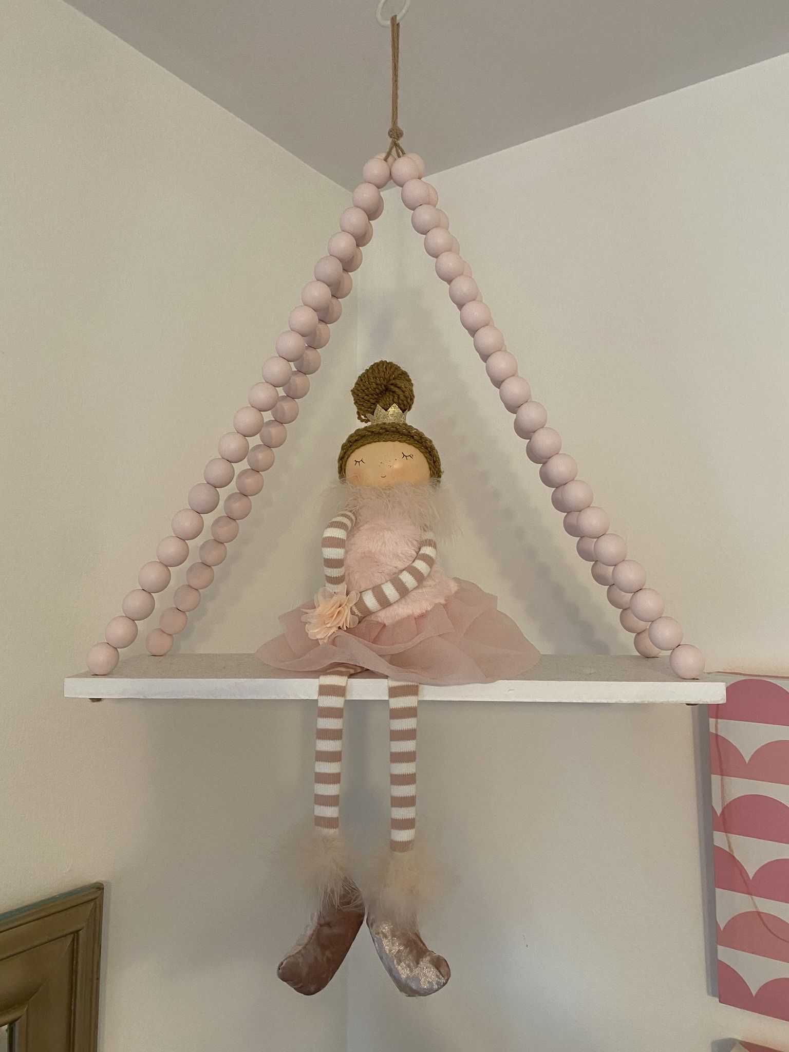 Weighted Doll On Swing
