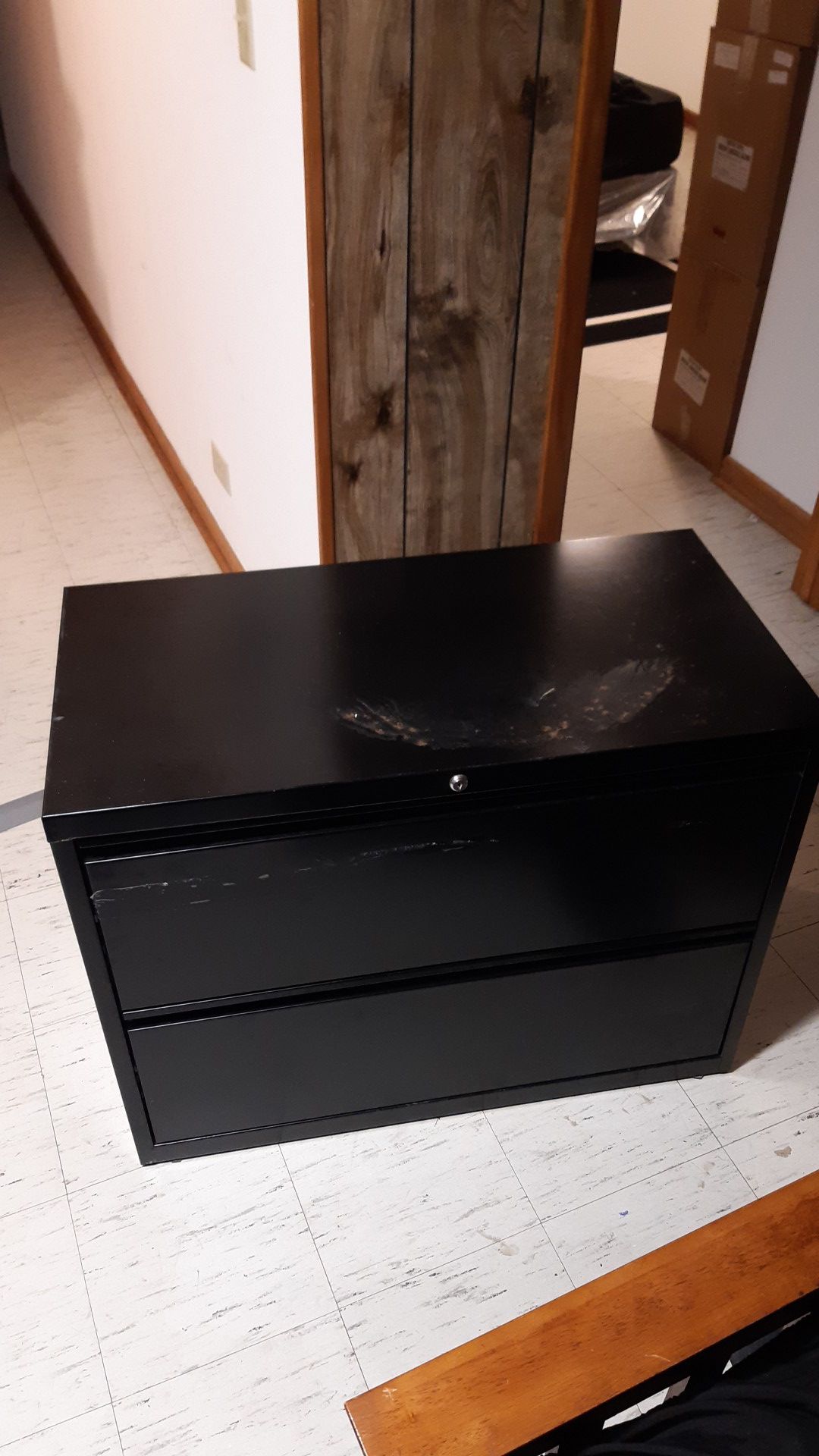 2 Drawer All metal file cabinet tiles on the floor are 12 x 12 so you get an idea how big it is
