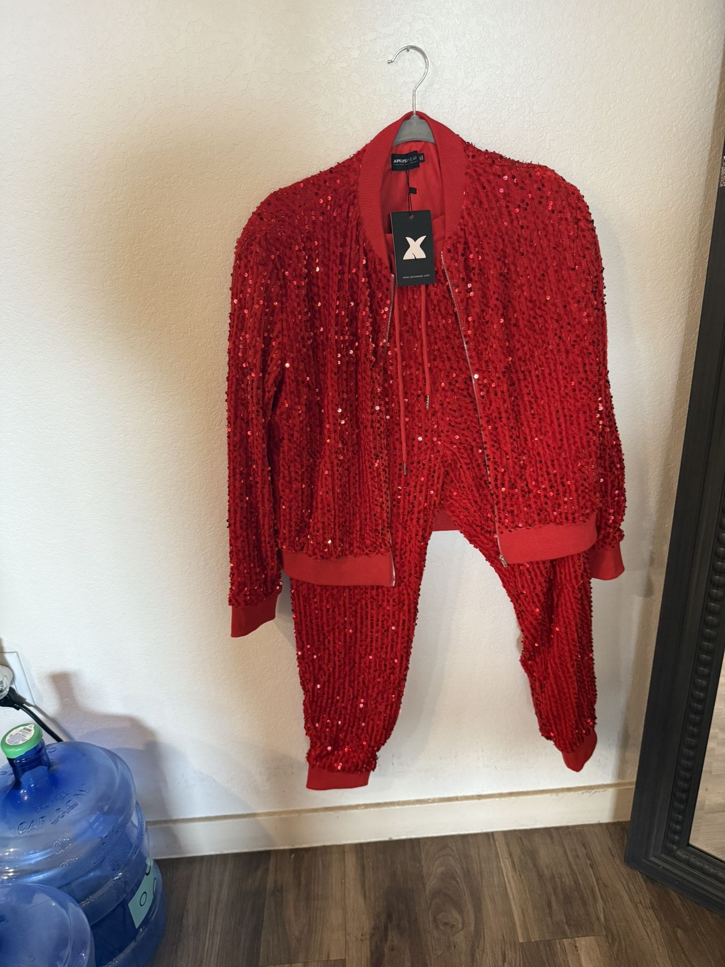 Red sequin 2 pc jogger set with drawstring pants and bomber jacket with side pockets.