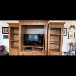 Entertainment 3 piece set with shelving and cabinets