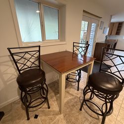 Table and bar stools