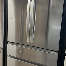 NEW OPEN BOX LG FOUR DOOR REFRIGERATOR STAINLESS STEEL