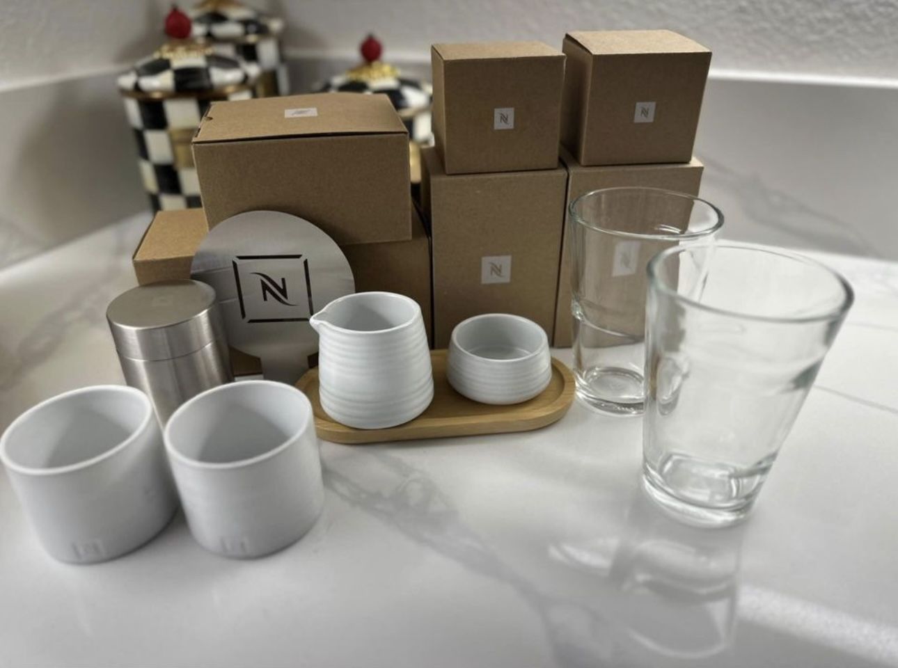 nespresso accessories (recipe glasses, barista cappucino kit, candle holders, sugar bowl & milk jug)