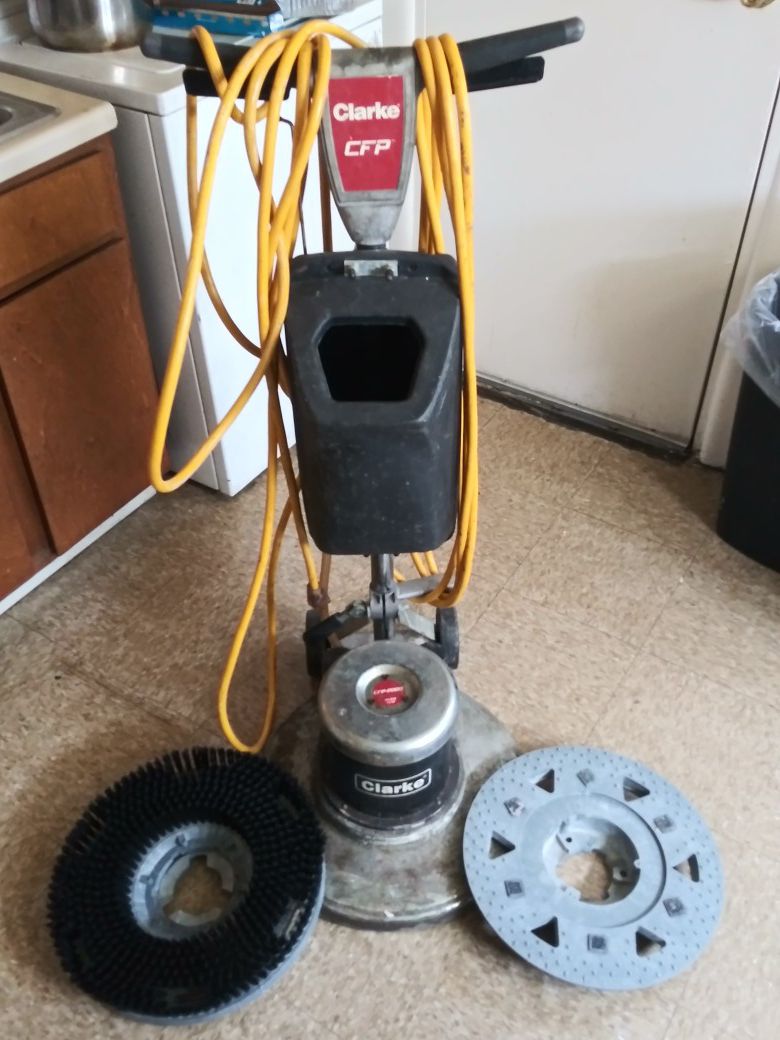 Floor scrubber with tank excellent condition only stains are wax and stripper stains. No exposed wiring or shortages. Price is negotiable.