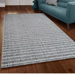 8/10 Indoor Outdoor Knotted Blue Gray Rug 