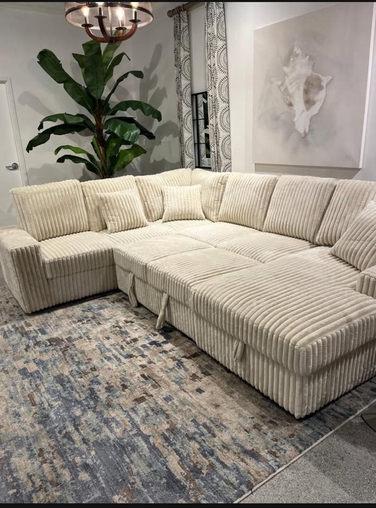 Cream Corduroy Sectional With Storage Space And Pull-Out Bed