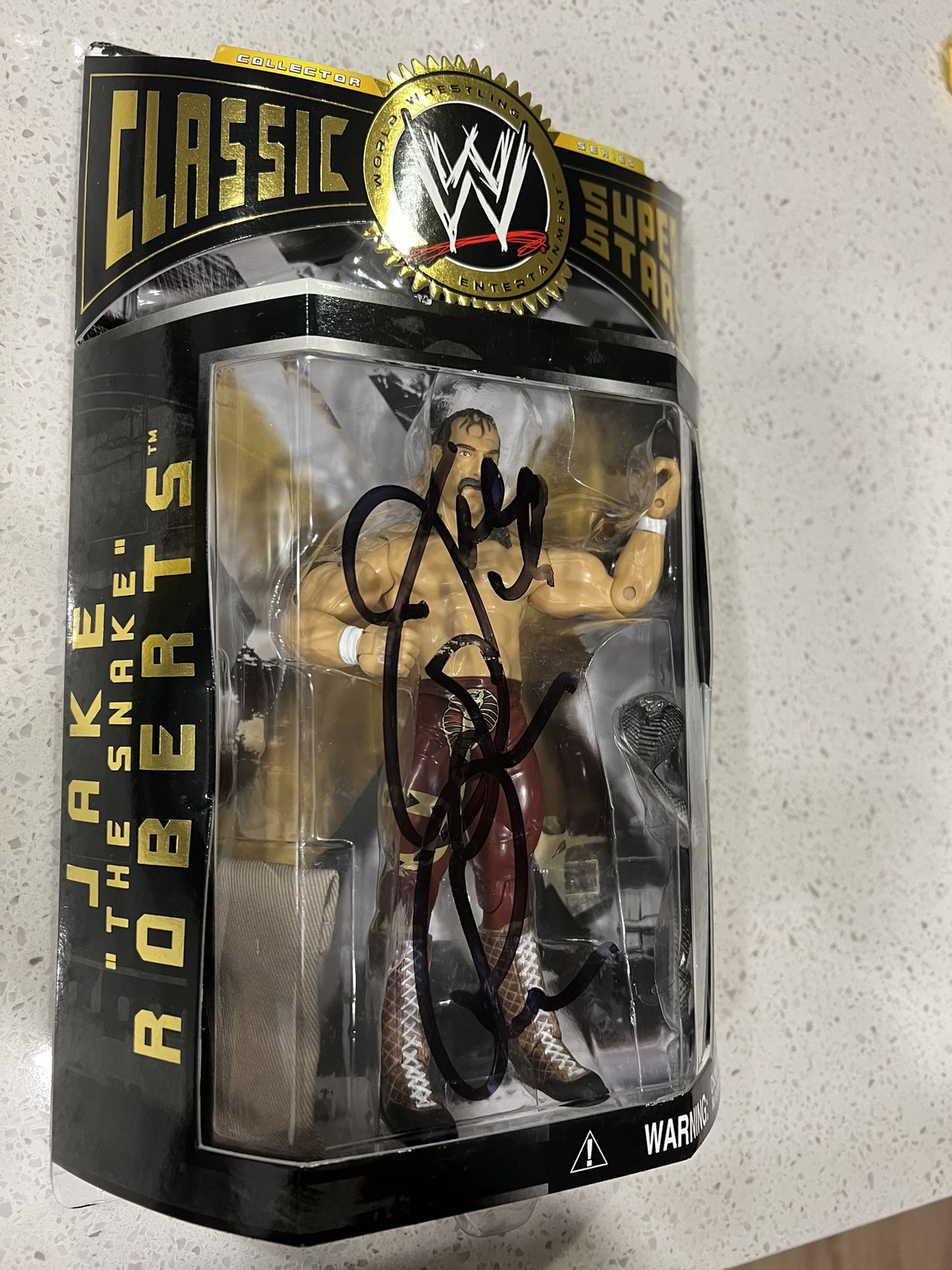 Autographed Classic super Stars Action figure “Jake the snake ”
