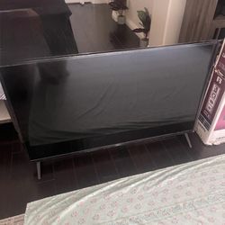 LG UHD TV, model 50UN70 (50-inch) in its original box.  