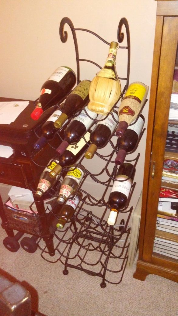 Wrought iron folding wine rack