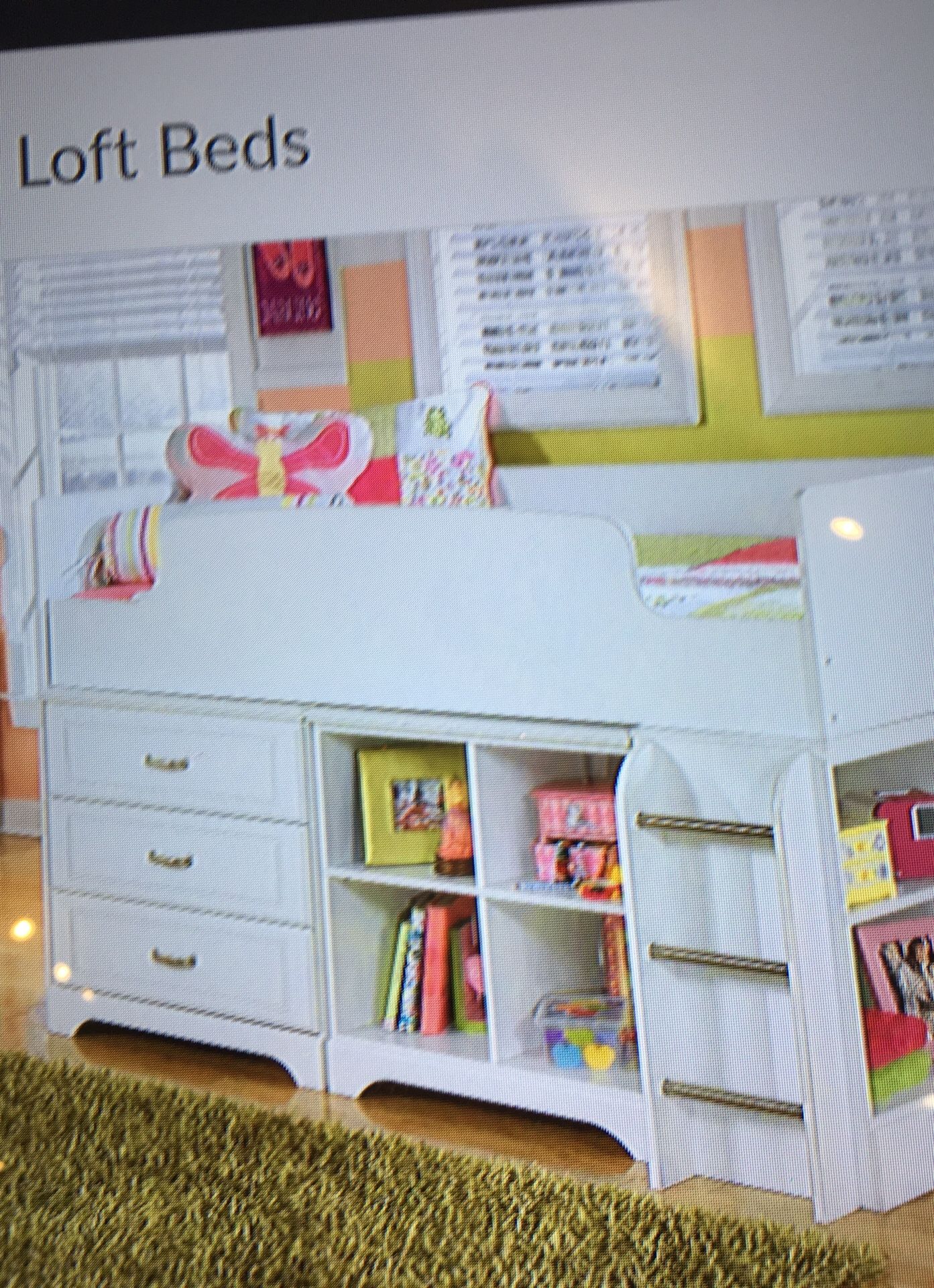 Twin loft bed with bin storage and also bookcase