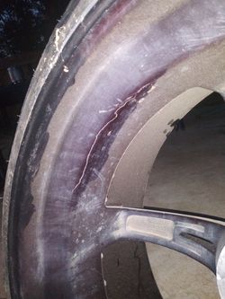 Rim and tires 250.00 OBO for all four 1 has crack