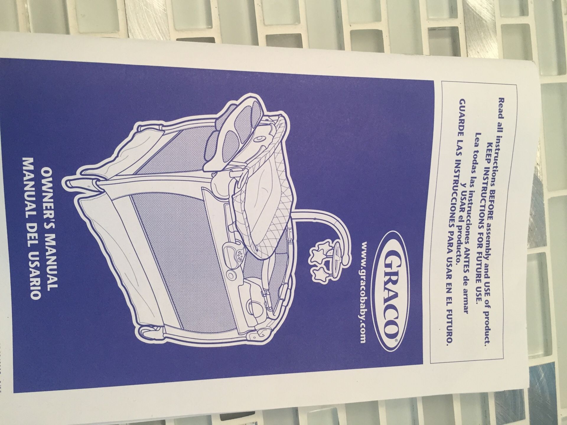 Graco playard with changing table and newborn bassinet & napper.