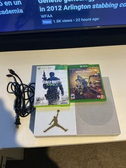 Microsoft Xbox One S 1TB, in good working condition, comes with mortal kombat 11 & call of duty MW3 no controller