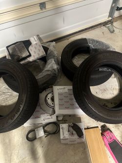 Like New 4Tires 4Break pads 2Front rotors and belt