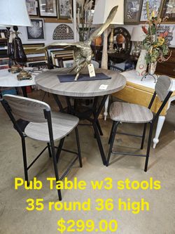 Table Pub Style W/3 StoolsWe are located at 2811 East Bell road. Another Time Around Furniture.
