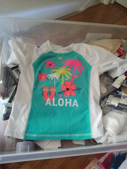 swim top. new. size 4/5 xsmall