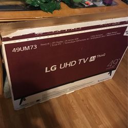 LG UHD 49”
