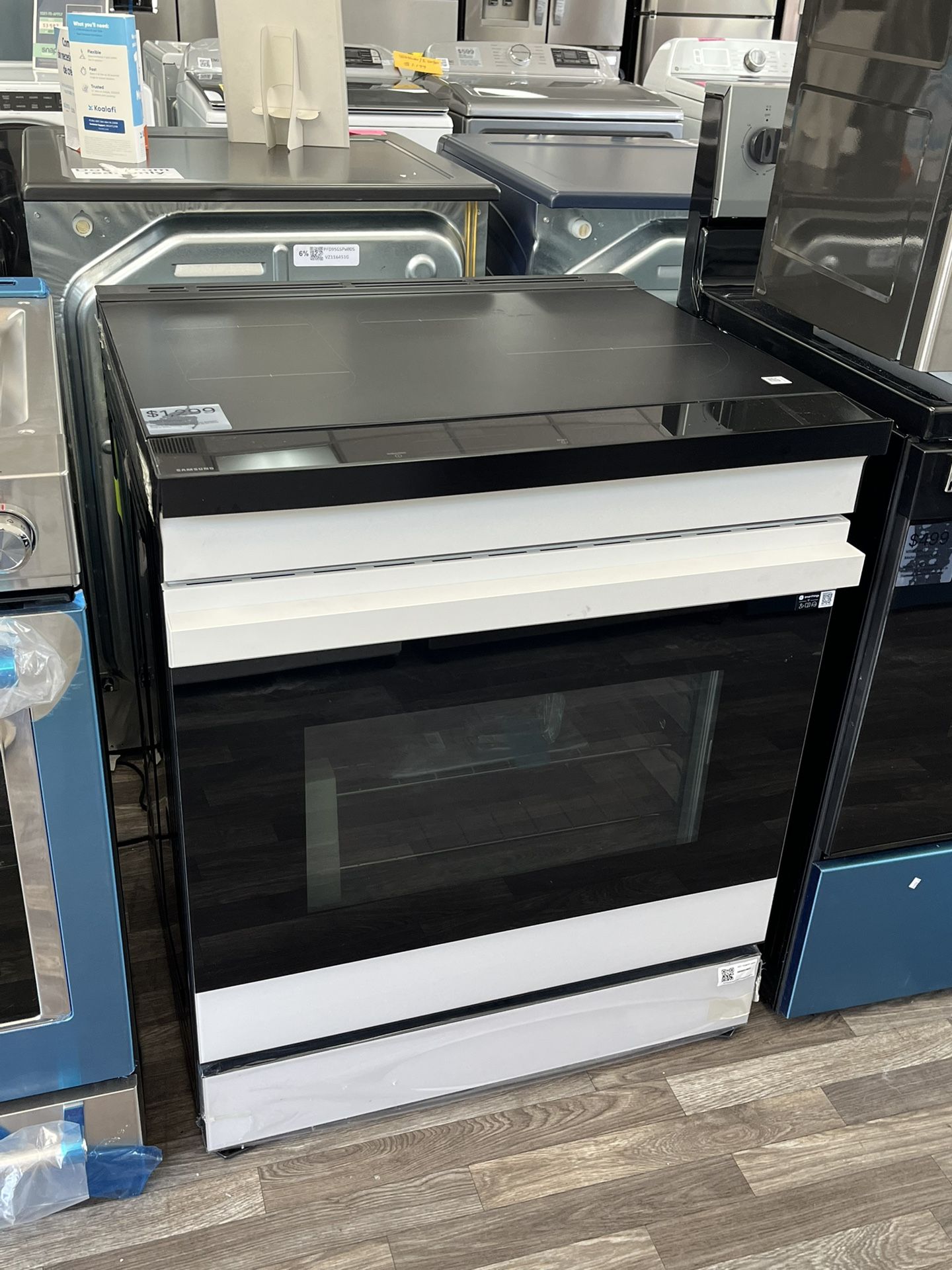 $1299 Bespoke 30” Slide In Range, 6.3 Cu Ft, 4 Burner Element, Open Box, One Year Warranty