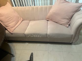 Used pink couch ... good fabric