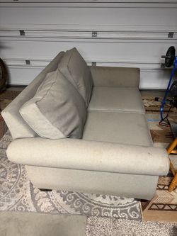 Free Cream colored fabric loveseat