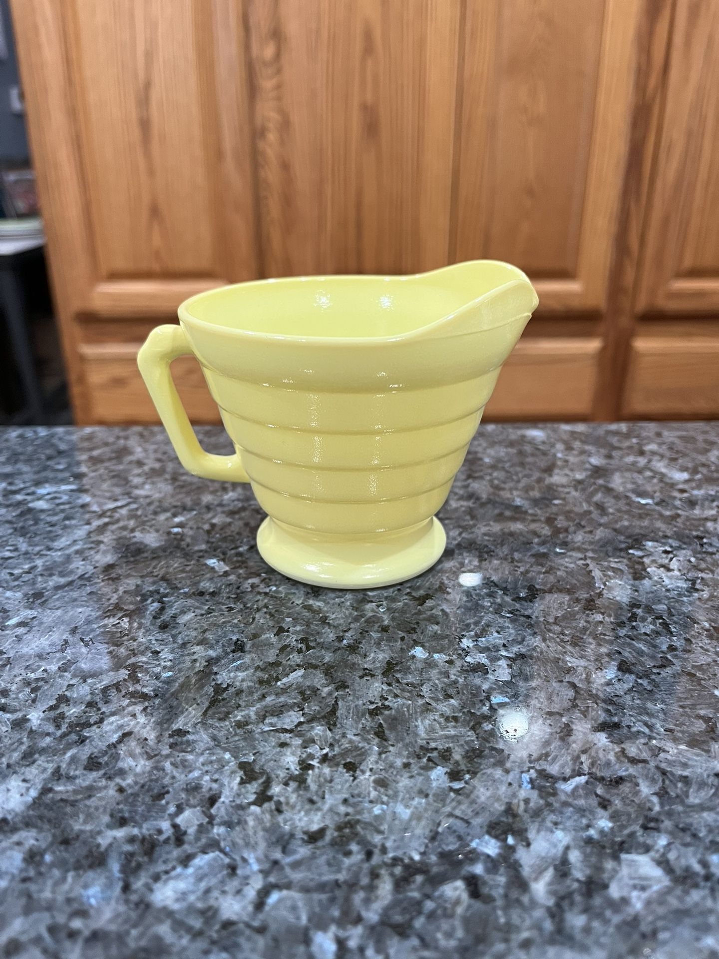 Vintage Pastel Glass Creamer Yellow . Size approximately 3 1/2 inches tall. Preowned Excellent condition no cracks or chips. Has been on display i