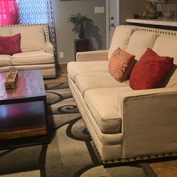 Tan Sofa and loveseat normal wear and tear Super Comfortable 👌 I'm Moving soon can't take them pet and smoke free / they need a little cleaning on ar