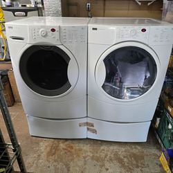 Kenmore Elite White Electric Washer and Dryer Set with Pedestals.