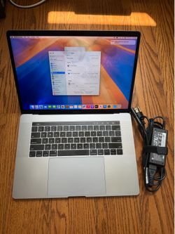 MacBook Pro 15 inch 2019 8GB RAM 256GB SSD Good battery screen Glitch