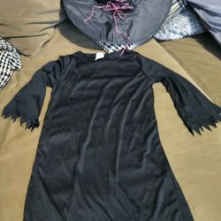 Witch costume black classic dress with black witch hat with pink lace size  small 4-6 fitted.

