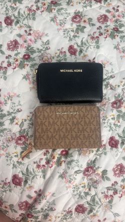 Two Michael Kors wallets