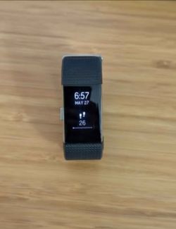 Fitbit Charge 2 fitness tracker with charging cables