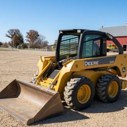 06 John Deere 320 Skid Steer Loader