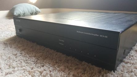 Whole house audio controller amplifier