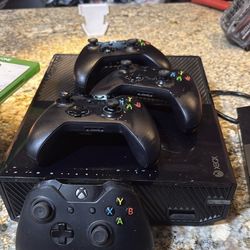 X-Box w/ 4 controllers and lots of games!