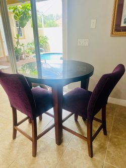 Granite round top bar table and 2 high chairs