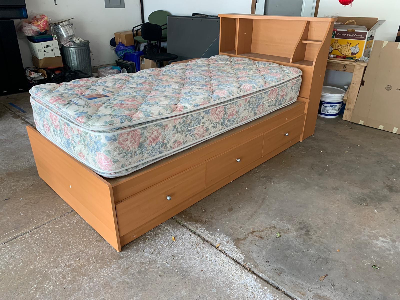 Twin Capitan bed with matters and storage drawers, end table