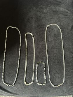 Silver Chains, Bracelet, And Coins