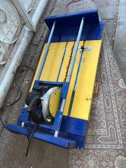 Yellow blue and grey tool power table saw