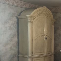 light wood two piece armoire 