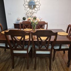 Dinning room table with 6 chairs, server,  and bench