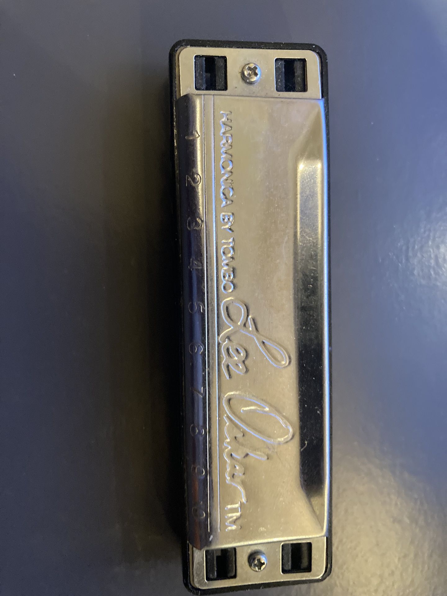 Two Harmonicas With Holder