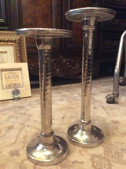 Tall silver candle stands