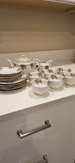 TEAPOT, SAUCERS, TEA CUPS, PLATES, CREAMER