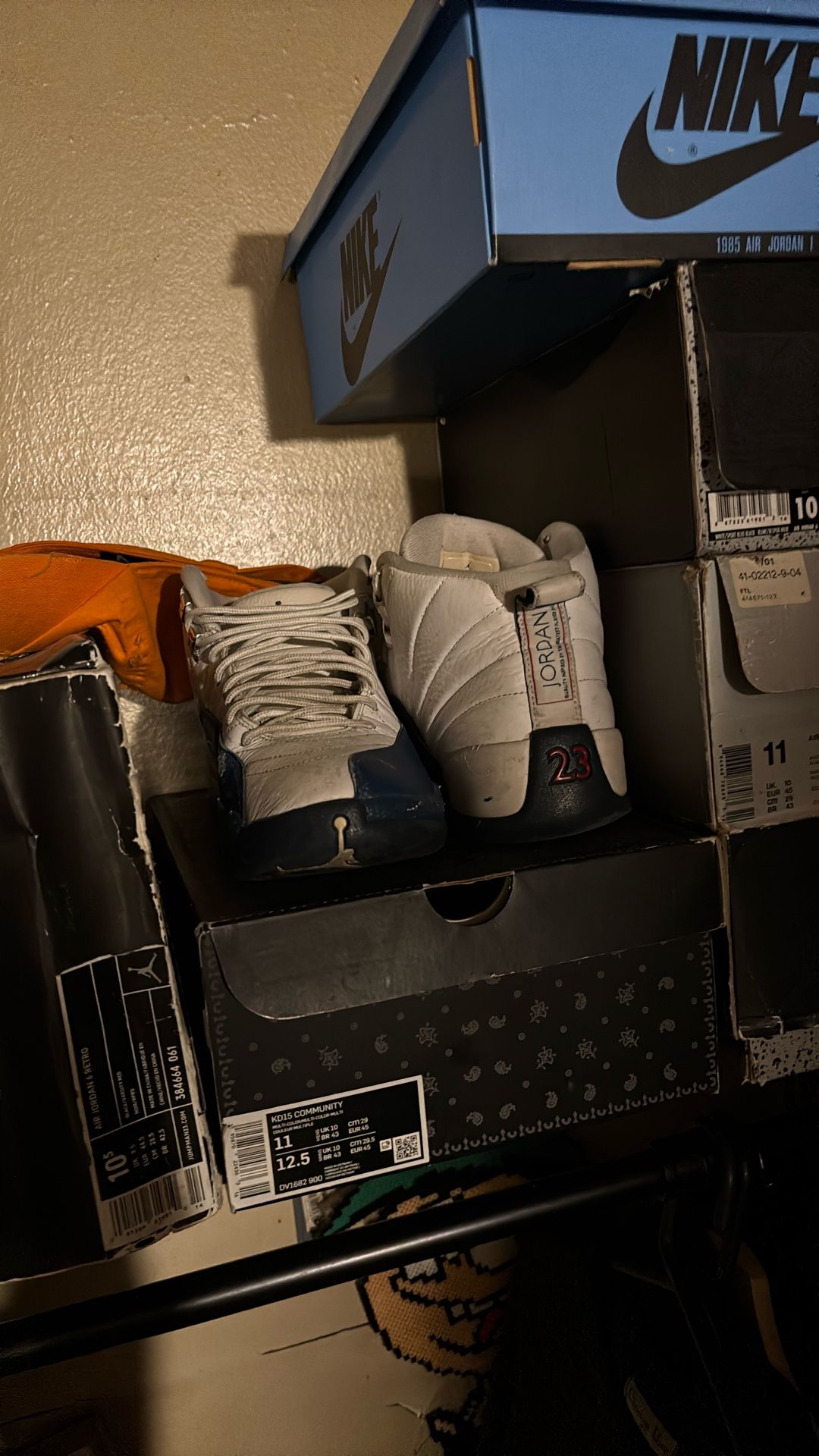 White and blue Jordan 12s